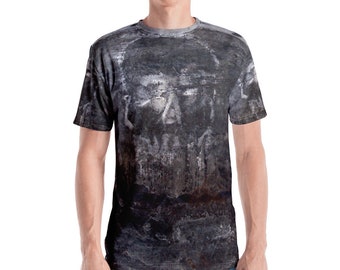 Pode incluir: Uma camiseta preta e cinza com um design de caveira. A caveira é feita de um padrão texturizado e abstrato.