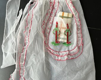 Vintage anni '50 (2) Grembiuli natalizi classici da padrona di casa in nylon trasparente - 1 bianco - 1 rosso.