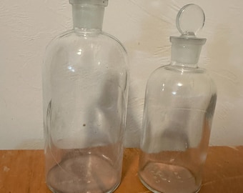 Antique T.C. Wheaton Co early 1888’s-1910-TCW (2) Laboratory Bottles with production label area- Clear glass with Coin Stoppers.