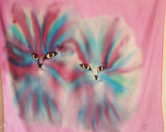 Vintage Beautiful Cats Eyes French Silk Scarf on a rainbow of colour and hot pink background. A real show stopper artisan accessory.