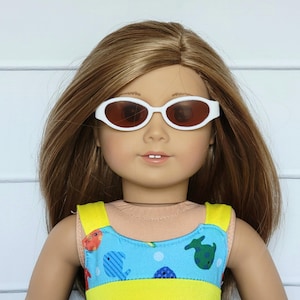 Sunglasses, white, brown tinted lenses, plastic frames, hinged earpieces, fits 18" American Girl or similar size dolls