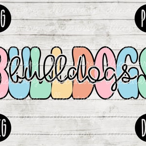May include: A colorful graphic design of the word "Bulldogs" in a retro style. The letters are outlined in black and filled with pastel colors, including pink, blue, green, yellow, and orange.