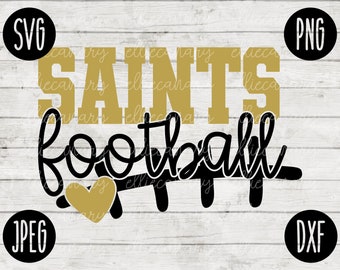 May include: Gold and black graphic design with the text "Saints Football" and a heart shape. The design is on a white wood background.