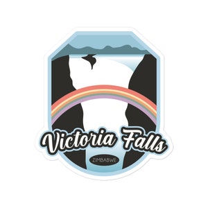 May include: A sticker featuring an illustration of Victoria Falls with a rainbow. The design includes a waterfall, mountains, and the text "Victoria Falls" in a stylized font, with "ZIMBABWE" below.