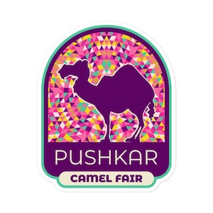 May include: A sticker featuring a purple camel silhouette against a colorful geometric background. The text "PUSHKAR" is above "CAMEL FAIR" in a white font, set within a purple and teal frame. The design is vibrant and eye-catching.