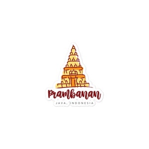 Könnte beinhalten: Ein Aufkleber mit einer handgezeichneten Illustration des Prambanan-Tempels in Java, Indonesien. Der Tempel ist in Gelb und Orange dargestellt, mit dem Text "Prambanan" in roter Kursivschrift und "Java, Indonesien" in kleinerer roter Schrift darunter.