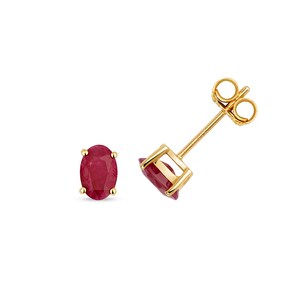 May include: A pair of gold earrings with oval-shaped ruby gemstones.