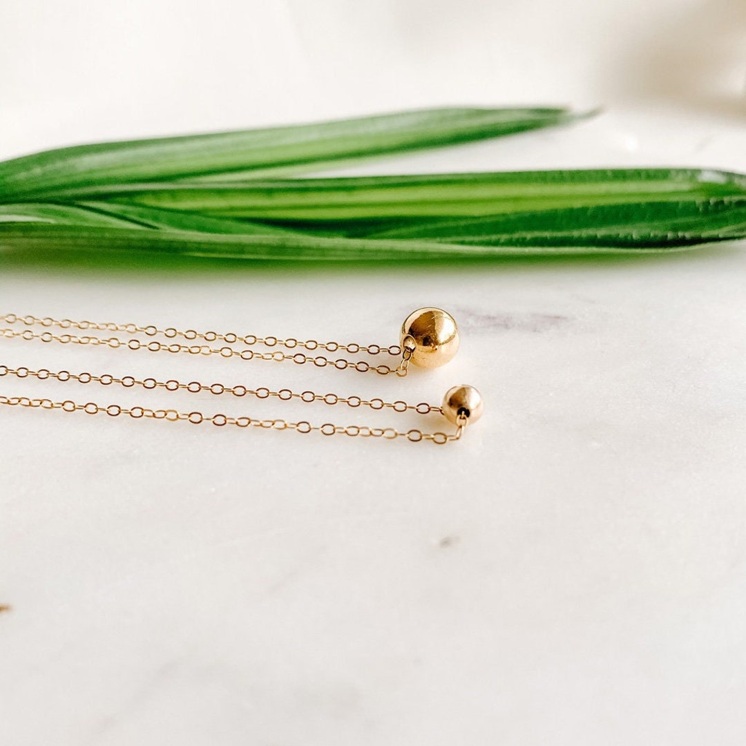 Gold Plated Dangling Ball With Chain Necklace For Women