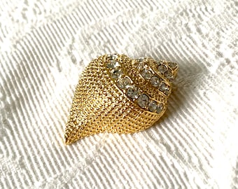 Broche colgante vintage KJL SHELL ENHANCER con forma de concha de caracol dorada