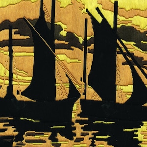 May include: Embroidered artwork depicting two sailing boats in silhouette against a sunset. The boats are black, with detailed rigging. The sky is a blend of yellow, gold, and brown, with a textured appearance. The water reflects the boats and sky.