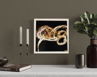 Pintura enmarcada de 12 x 12 en negro, dorado y blanco: "Graffiti"