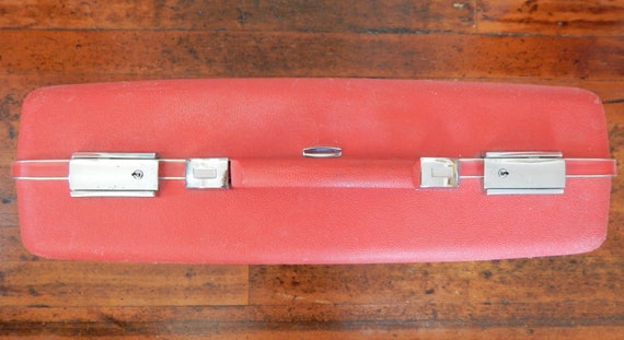 red suitcase vintage