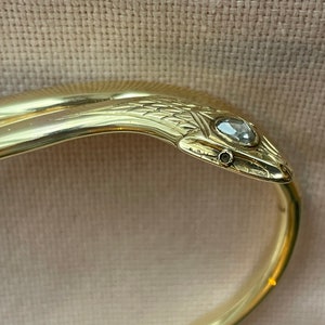 A 14 karat gold rose cut diamond snake bangle image 9