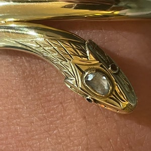 A 14 karat gold rose cut diamond snake bangle image 6