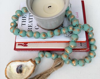 Long Turquoise Beaded Garland with Gold Oyster Shell & Tassel, Coastal Decor, Boho Beach House Accent, Decorative Wood Beads, Shelf Styling