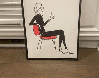 May include: Black framed art print featuring a minimalist illustration of a person seated in a red chair, holding a cup. The person is wearing black clothing and glasses. The artwork has a simple, elegant style, perfect for home decor.