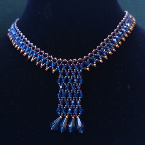 Blue beaded choker with gold centerpiece main image 1