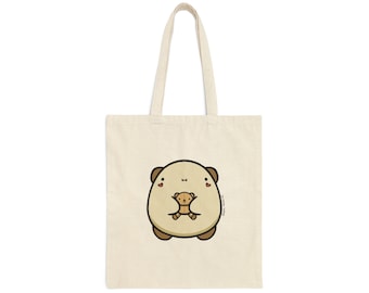 May include: Cream-colored tote bag featuring a cartoon illustration of a large, round bear hugging a smaller bear. The bears are brown and tan, with small hearts on either side of the larger bear's face. The bag has long handles.