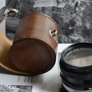 Custodia in pelle per obiettivo standard da 50 mm Canon, Nikon Leica, Pentax, Minolta ecc.