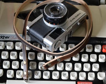 Leren bruine of zwarte camerariem voor Nikon Canon Pentax Minolta Leica Olympus fujifilm