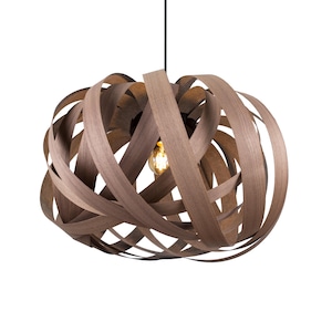 May include: A brown wooden pendant light fitting with a unique woven design. The light fitting is suspended from a black cord.