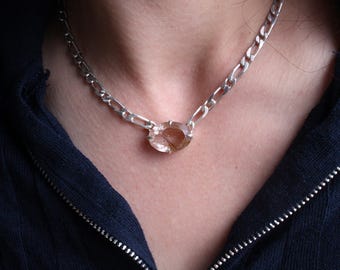 Large silver necklace with a rutiled quartz