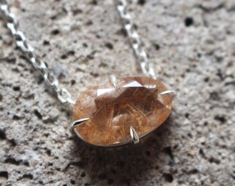 Rutiled quartz pendant and silver necklace