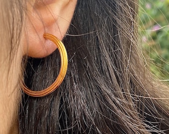 Textured gold earrings