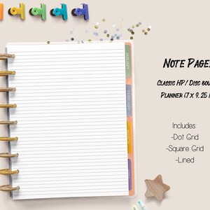 May include: A white, lined notebook with a gold coil binding. The notebook is part of a planner system and includes tabs for January, February, March, and April. The notebook is 17.8 cm by 23.5 cm and includes dot grid, square grid, and lined pages.