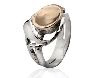 A Symphony of Metals: Silver and Gold Statement Ring