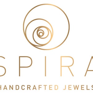 May include: A gold logo with a stylized spiral design and the word "SPIRA" in a sans-serif font. Below the word "SPIRA" is the text "HANDCRAFTED JEWELS".