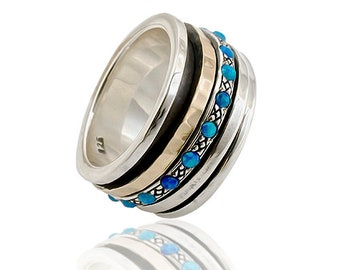 A Symphony of Textures: Unique Silver and Gold Opal Spinner Rings that Engage Your Senses