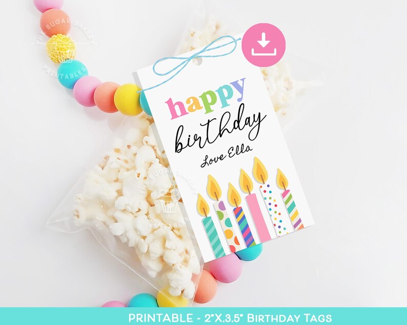 May include: Printable birthday gift tags with a colorful candle design. The tag says "happy birthday" with a space for a name and the text "love Ella".