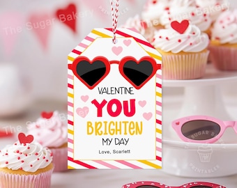 May include: Valentine's Day gift tag with red heart sunglasses and the text "Valentine You Brighten My Day Love, Scarlett".
