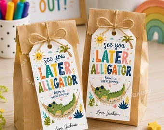 May include: Two brown paper gift bags featuring white rectangular tags tied with twine. The tags display a colorful illustration of an alligator in a hammock with the text "see you LATER ALLIGATOR have a GREAT SUMMER!" and "Love Jackson".
