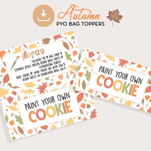 May include: Two printable tags with a fall leaf pattern. The text on the tags reads "Paint Your Own Cookie".