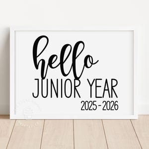 May include: Black and white printable sign with the text "hello junior year 2025-2026".