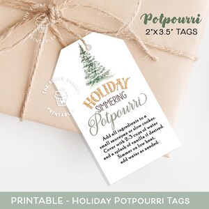 May include: Printable holiday potpourri tags with a gold glitter design. The tags feature a watercolor illustration of a pine tree and the text "Holiday Simmering Potpourri". Instructions for making the potpourri are included on the tag.
