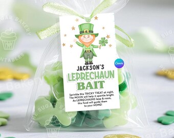 May include: A white tag with a green leprechaun illustration and the text "JACKSON'S LEPRECHAUN BAIT" with instructions to sprinkle the treat at night to attract leprechauns. The tag is tied to a clear plastic bag filled with green shamrock-shaped candies.