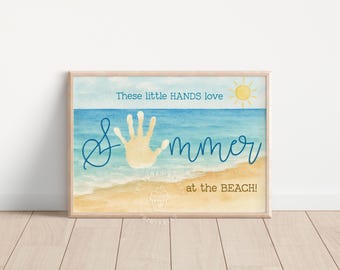 Arte de mãozinhas na praia para imprimir, lembrancinha perfeita para crianças e bebês. Artesanato de verão faça você mesmo com tema oceânico. Presente ideal para crianças. Atividade de verão para crianças.
