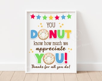 May include: A colorful printable sign with the text "You Donut Know How Much We Appreciate You!" and a donut graphic. The sign is decorated with stars and the words are in different colors.