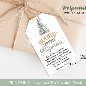 May include: Printable holiday potpourri tags with a green pine tree design. The tags are 2 inches by 3.5 inches and have instructions for simmering the potpourri. The text reads "Holiday Simmering Potpourri".