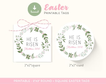 May include: Printable Easter tags with a floral wreath design. The tags feature the text "He is Risen" with a scripture reference, Matthew 28:6. The tags are available in two sizes: 2x2 inches square and 2x2 inches round.