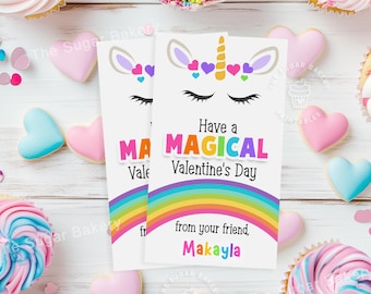 Może przedstawiać: Dwie drukowane kartki walentynkowe z jednorożcem z tęczą i tekstem "Have a Magical Valentine's Day from your friend, Makayla".