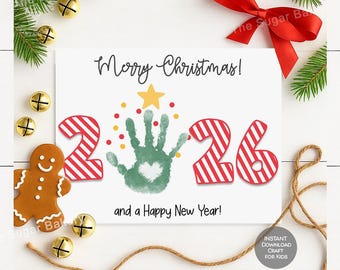 May include: A white rectangular card featuring the text Merry Christmas and and a Happy New Year. The design includes a green handprint with a white heart in the center, a yellow star, red and yellow dots, and the red and white striped numbers 2026.