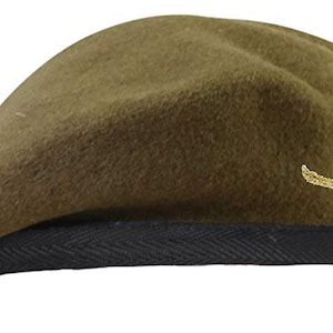 May include: A dark green beret with a black band and a gold eagle badge.
