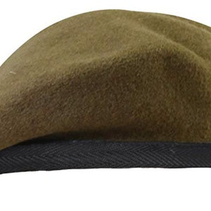 May include: A green beret with a black band around the bottom.
