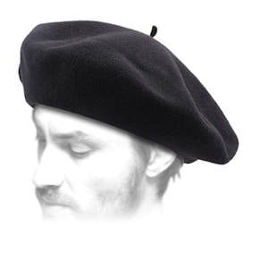 May include: A black beret made of wool. The beret is worn on a person's head.