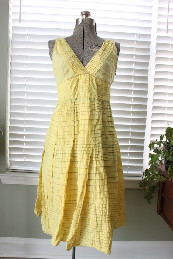 1970s Unlabeled Light Yellow Jersey Layered & Tiered Halter Dress