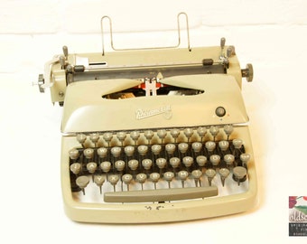 vintage typewriter  Rheinmetall  (tw15), ca. 1950s, with original case, with ribbon, fully functional!